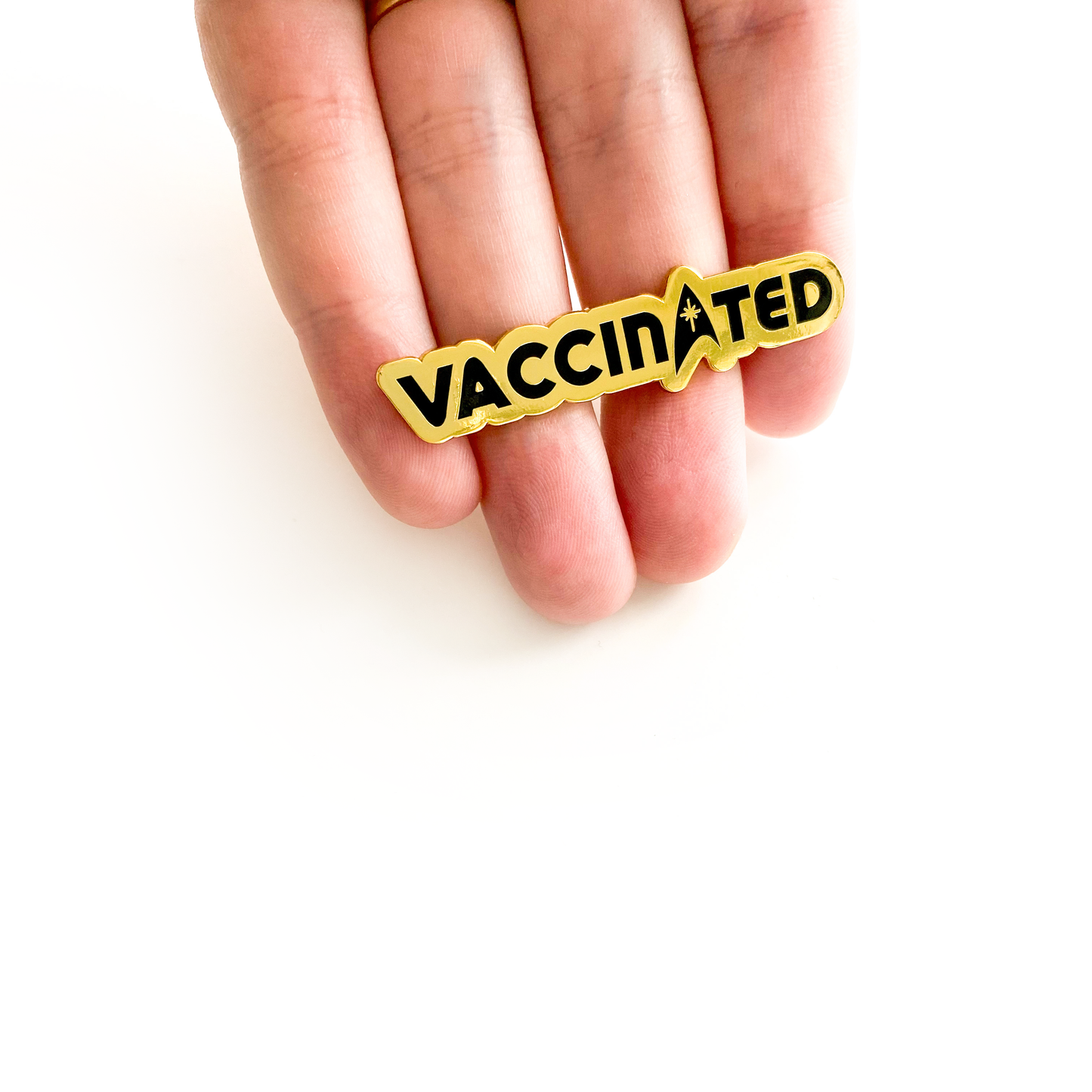 vaccinated in space enamel pin